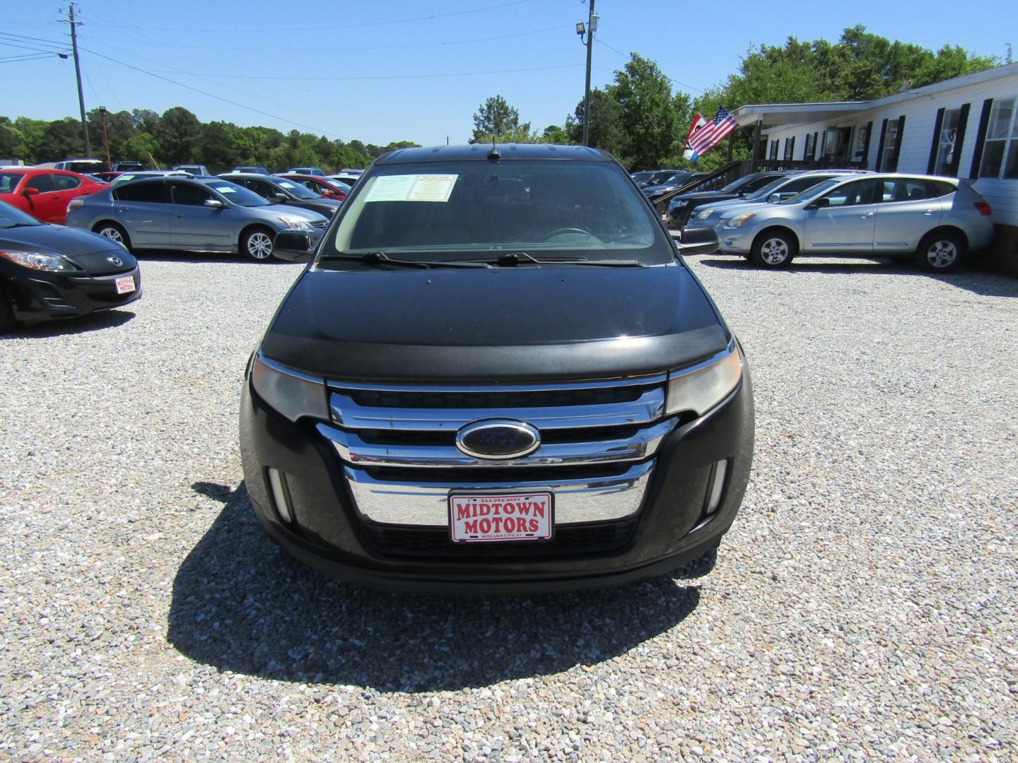 2011 Black /Tan Ford Edge SEL FWD (2FMDK3JC4BB) with an 3.5L V6 DOHC 24V engine, Automatic transmission, located at 15016 S Hwy 231, Midland City, AL, 36350, (334) 983-3001, 31.306210, -85.495277 - Photo#1